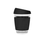 A reusable coffee cup with a black, opaque silicone band and matching black lid. The cup is transparent below the band, showcasing its sleek, modern design. The lid has a streamlined, angled shape for easy sipping.