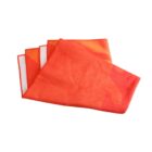 A folded orange and red microfiber towel with white edges, neatly stacked.