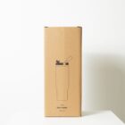 A tall, plain cardboard box with a simple line drawing of a water bottle on it. The box is standing on a white surface against a white background. The text below the drawing reads 5906 Ultra Bottle 850 mL.