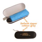Open hard case with a gray zipper containing a blue cloth. Below, the closed case is labeled TEAM PRO in gold text. Orange arrows and text indicate the default zipper color is gray.