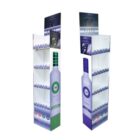 Two tall retail display stands with images of bottled beverages and product branding. Each stand has multiple shelves displaying bottles, with colorful graphics and text promoting the products.