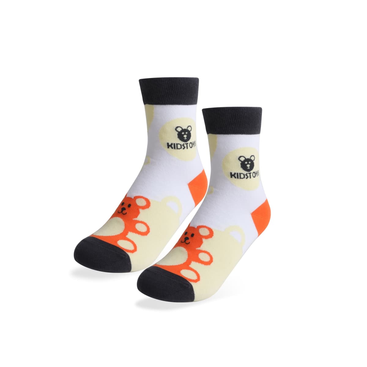 Childrens socks with black and orange bear designs, featuring KIDSTORY text. The socks have a black cuff, heel, and toe with a bright orange section on the lower part. The background of the socks is white.