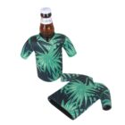 A beer bottle wearing a green palm leaf patterned shirt-shaped cooler, with another identical cooler beside it.