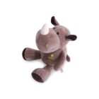 A plush toy rhinoceros with a gray body, a white horn, and black-tipped ears. It is sitting upright with a fabric tag attached to its side and a small embroidered logo on its chest.