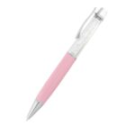 A pink ballpoint pen with a silver clip and tip. The upper part of the pen is clear and filled with small decorative crystals.