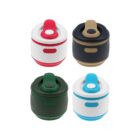Four compact travel mugs with lids in red, black, green, and blue color schemes. Each mug has a handle on the lid for easy carrying and a color-coordinated button. The mugs are arranged in a 2x2 grid on a white background.