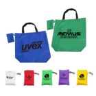 Various colored reusable shopping bags with black handles and logos. A blue and green bag are prominent. Below them are folded versions in white, red, purple, green, and yellow, each with a black clip attached.