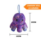 Plush toy octopus with a colorful pattern, featuring a grumpy expression. The toy is shown with measurements indicating a size of 10cm by 10cm. A label in the top right corner reads custom size available.