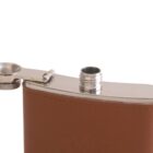A close-up of a hip flask with a brown leather cover and an open metal cap. The cap is attached to the flask by a small hinge, revealing the flasks spout. The leather has a textured appearance.