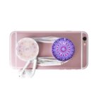 A pink smartphone with white earphones wrapped neatly around patterned pop sockets attached to the back. The pop sockets feature intricate mandala designs in soft pink and purple hues.