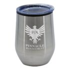 A stainless steel tumbler with a clear lid featuring an eagle logo and the words Pinnacle Management engraved on the front.