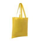 A plain, bright yellow reusable tote bag with two long handles is seen against a white background.
