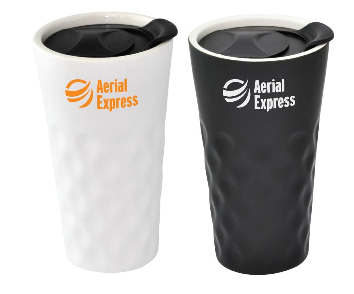 Two travel mugs with lids are shown. The left mug is white with an orange Aerial Express logo, while the right mug is black with a white Aerial Express logo. Both have a textured pattern.