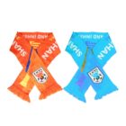 Two overlapping scarves, one orange and one blue. Each features the text SHAH with a shield emblem containing a soccer ball at the bottom. Fringed ends are visible on both scarves.