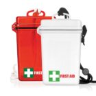 Two waterproof first aid boxes, one red and one white, with green cross symbols and FIRST AID labels. Each box has a rope handle, set against a plain background.