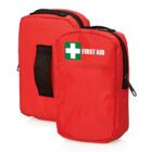 Two red first aid kits with black zippers and handles. One kit is slightly larger. The front shows a white cross on a green background, with the words FIRST AID next to it.