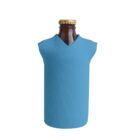 A brown glass bottle with a gold cap is covered in a light blue koozie fashioned like a sleeveless shirt, featuring a V-neck.