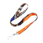 A colorful lanyard with a blue, orange, and black pattern and white dots. It has a metal clip on one end and a plastic buckle in the middle. The text WATER is printed on the orange section near the clip.
