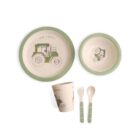 Childs dinnerware set featuring a tractor design. Includes a green-rimmed plate with a tractor print, a matching bowl, a cup, and utensils with green handles. Perfect for a farm-themed meal.