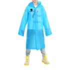 Child wearing blue raincoat and yellow boots, standing against a white background.