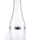 A transparent plastic bottle with a detachable lid and a handle at the top. The body of the bottle features a silver band. There are also plastic tongs included beside the bottle.