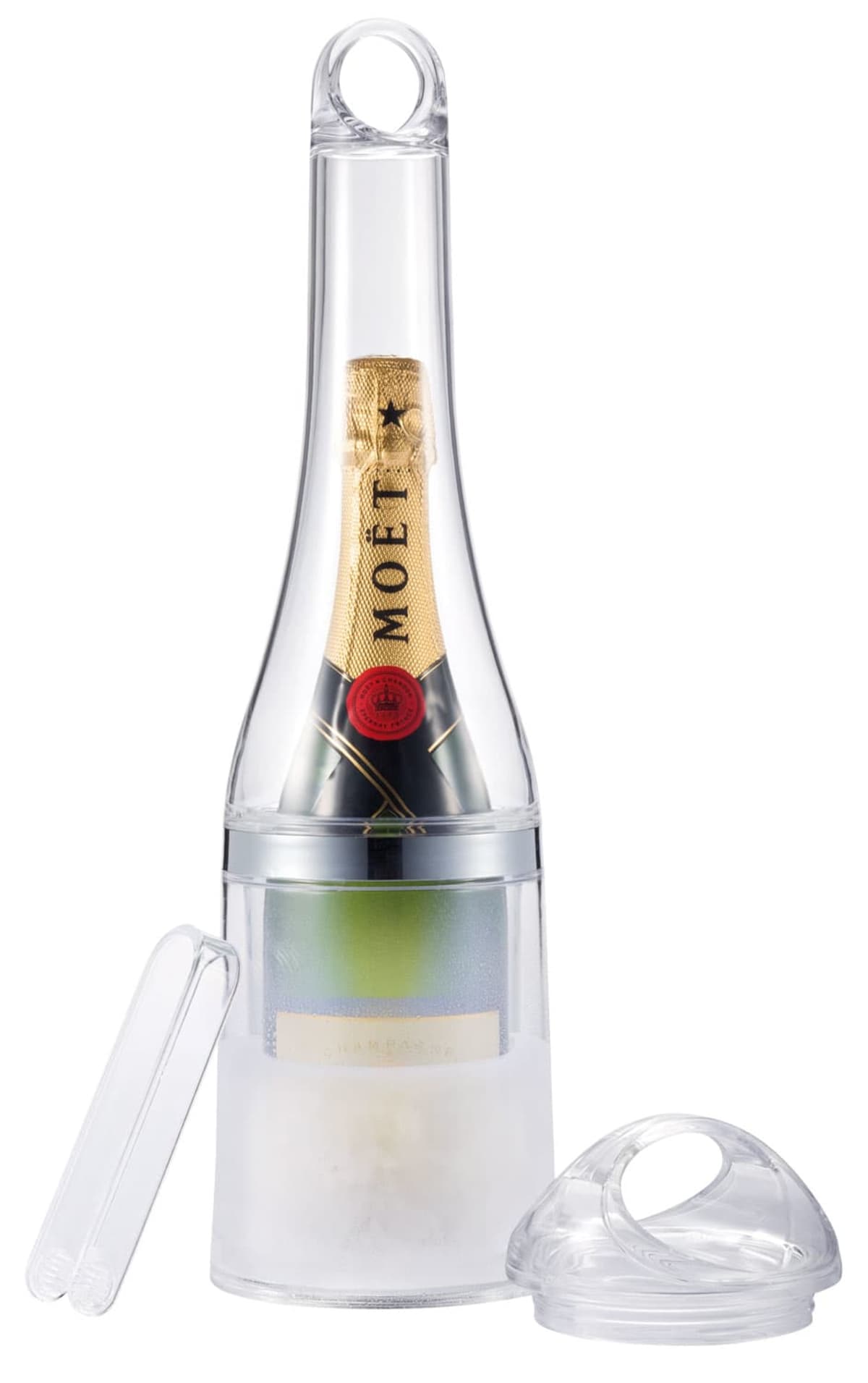 A bottle of Moët champagne is encased in a clear, bottle-shaped ice mold. The mold has a handle-like top and a detached cap beside it.