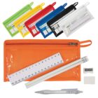 A collection of colorful zippered pencil cases, each with a transparent front. One orange case is open, displaying a ruler, two pencils, an eraser, a sharpener, and a pen. Other cases in green, yellow, red, blue, black, and white are in the background.