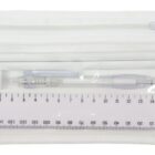 A transparent zippered pouch containing two white pencils, a white pen, an eraser, a sharpener, and a clear ruler marked in centimeters and millimeters. The pouch has a white fabric edge and a loop for hanging.