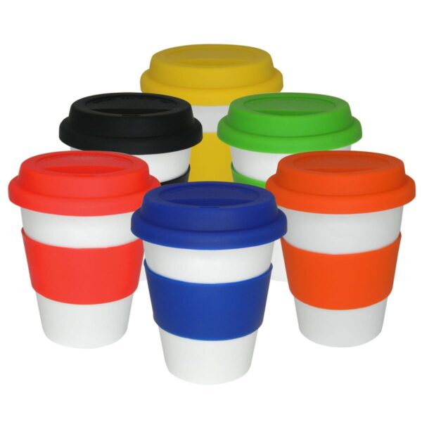 Six reusable cups with colorful silicone lids and bands: yellow, black, green, red, blue, and orange. The cups are white and arranged in two rows, with the middle cup at the back.