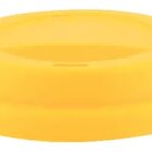 Yellow plastic lid with a circular shape and a small oval opening in the center.