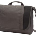 A gray messenger bag with a black accent on the top right. It features a handle on top and an adjustable shoulder strap. The front flap has a pocket. The fabric has a matte texture.