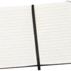 An open lined notebook with a black elastic band vertically placed in the center, lying flat. The pages are blank, featuring ruled lines and thin black borders.