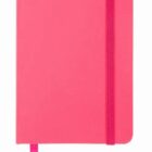 A closed pink notebook with a matching elastic band and a ribbon bookmark visible at the bottom. The cover is plain and smooth.