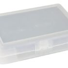 A small, translucent rectangular plastic case with a hinged lid, shown closed.