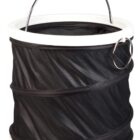 Collapsible black fabric bucket with a white rim, featuring a metal handle with a black grip. The bucket has a spiral structure, allowing it to expand and collapse. A metal ring is attached to the side near the top.