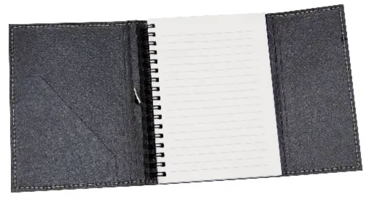 Open black leather notebook with a spiral binding. The left flap has a pocket, while the right flap is plain. The notebook contains lined white pages.
