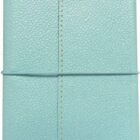 A textured, teal-colored notebook with a pebbled cover. It is closed and secured by a thin elastic band wrapped around the center. The notebook has visible stitching along the edges.