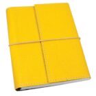 A closed yellow leather-bound journal with a textured cover is secured with an elastic band wrapped around it vertically. The stitching along the edges is visible, and the cover flap folds over the front.