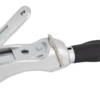 A multifunctional tool featuring a nail clipper and a pen attached, with a black grip on the pen side. The nail clipper is metallic with a foldable handle.