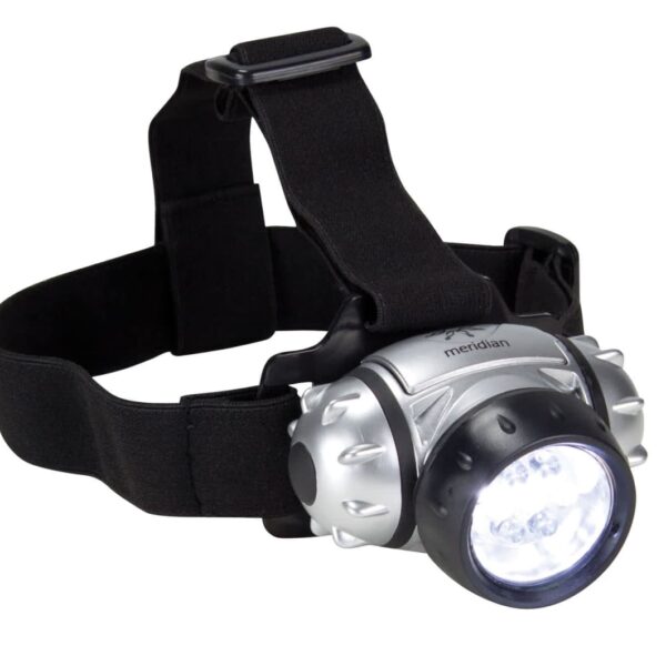 A silver and black headlamp with LED lights and adjustable straps sits against a white background. The lamp has a rugged design with a prominent circular light in the center.