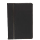 A black leather notebook or journal with cream stitching along the edges and a vertical line on the front cover. The notebook is closed, displaying a simple and elegant design on a white background.
