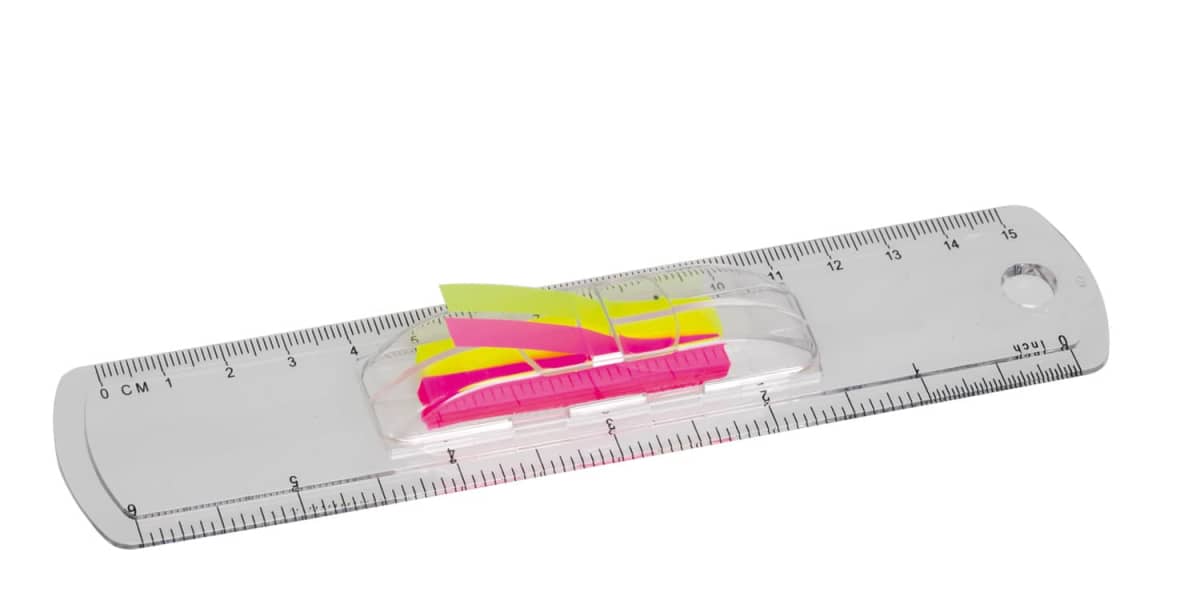 A transparent ruler with both metric and imperial measurements, featuring pink and yellow sticky tabs in the center.