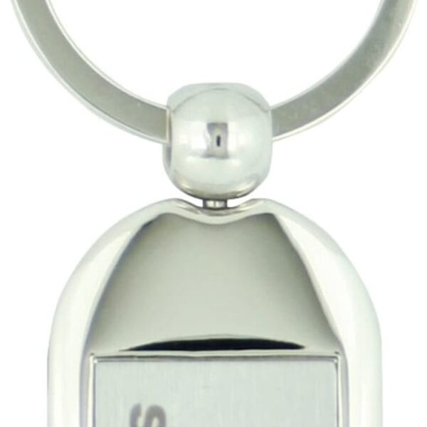 A metal keyring with a flat, rectangular pendant. The pendant features an engraved compass emblem and the word storm beneath it, both centered on the front surface.