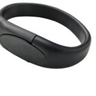 A black RFID wristband with an oval-shaped tag in the center.