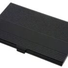 A sleek, black business card holder with a textured, ribbed surface. It features a small notch for easy opening.