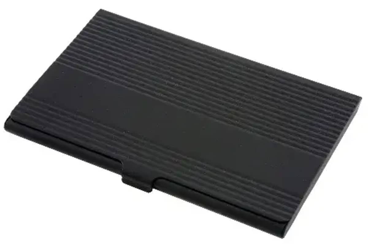 A sleek, black business card holder with a textured, ribbed surface. It features a small notch for easy opening.