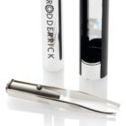 A metallic tweezer device with an attached LED light is positioned next to its cylindrical, silver and black storage case. The case displays the text RODDERICK vertically on its side.