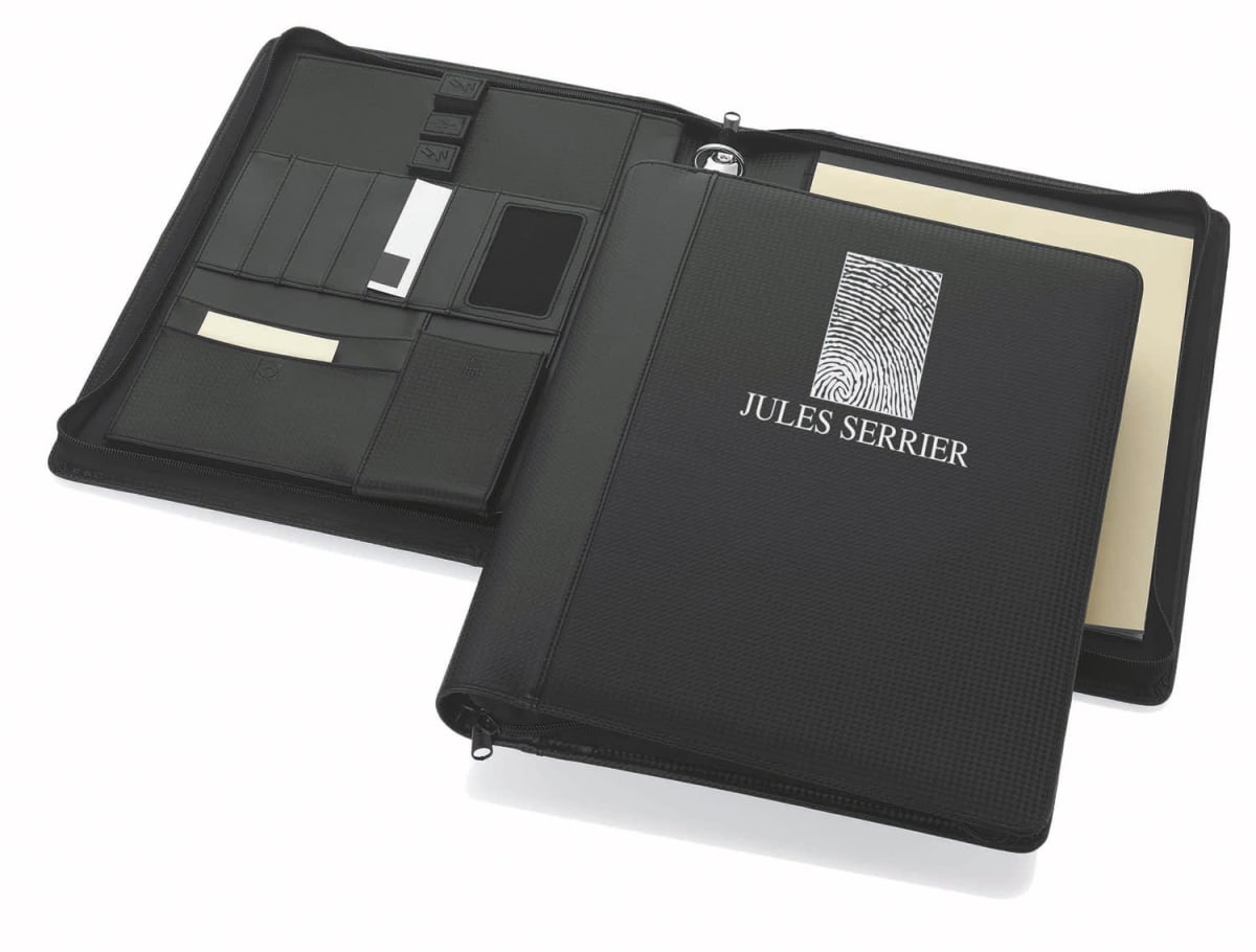 Open black leather portfolio with Jules Serrier and a fingerprint design on the cover. The interior features organized slots for cards, a pen holder, a notepad, and a section for loose papers.