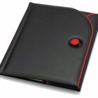 A sleek black folder with red accents and a circular red button closure. The folder has a curved flap design, giving it a modern and professional appearance.
