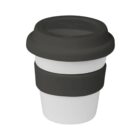 A reusable coffee cup with a black silicone lid and grip band, and a white body. The cup has a compact, stackable design, suitable for on-the-go use.
